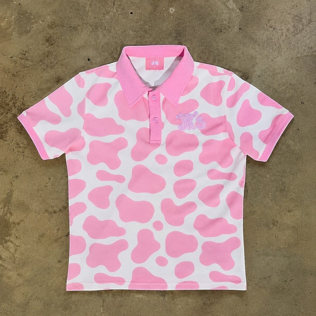 JR's Strawberry Milk polo shirt in pink and white cow print pique knit with embroidered logo detail.