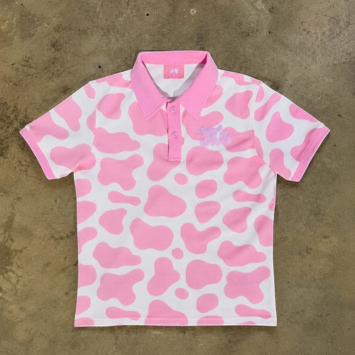 JR's Strawberry Milk polo shirt in pink and white cow print pique knit with embroidered logo detail.